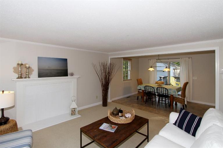 77 Sheffield Road Brewster, MA 02631 - Photo 10 of 26 a living room with furniture and a flat screen tv