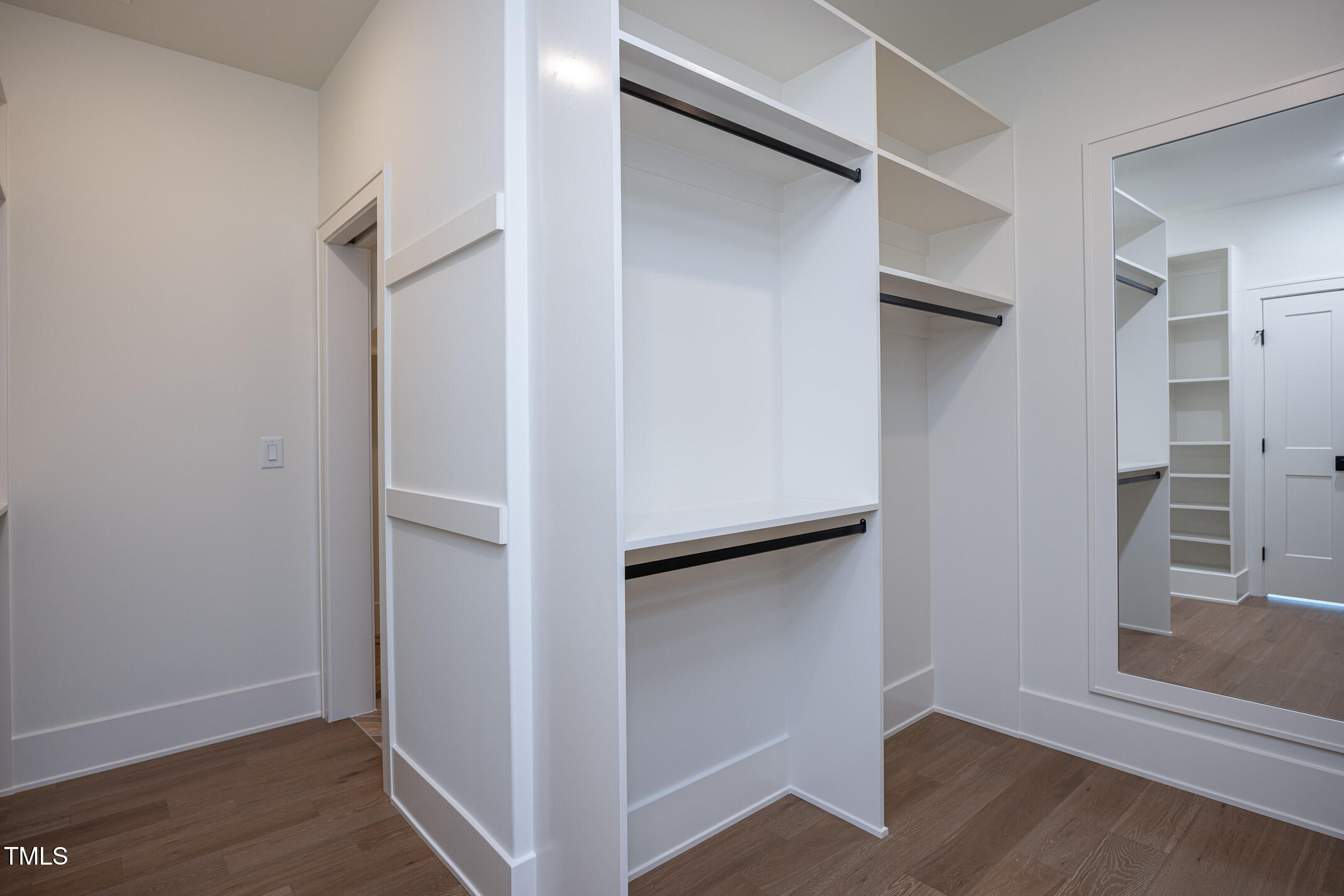 1000 Marilyn Drive Raleigh, NC 27607 - Photo 40 of 59 Primary closet to upstairs laundry room.