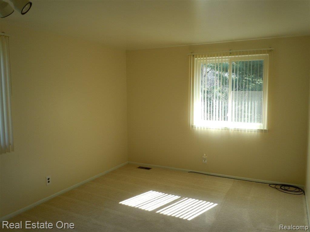 6593 North Tipsico Lake Road Holly, MI 48442 - Photo 12 of 18 Bedroom