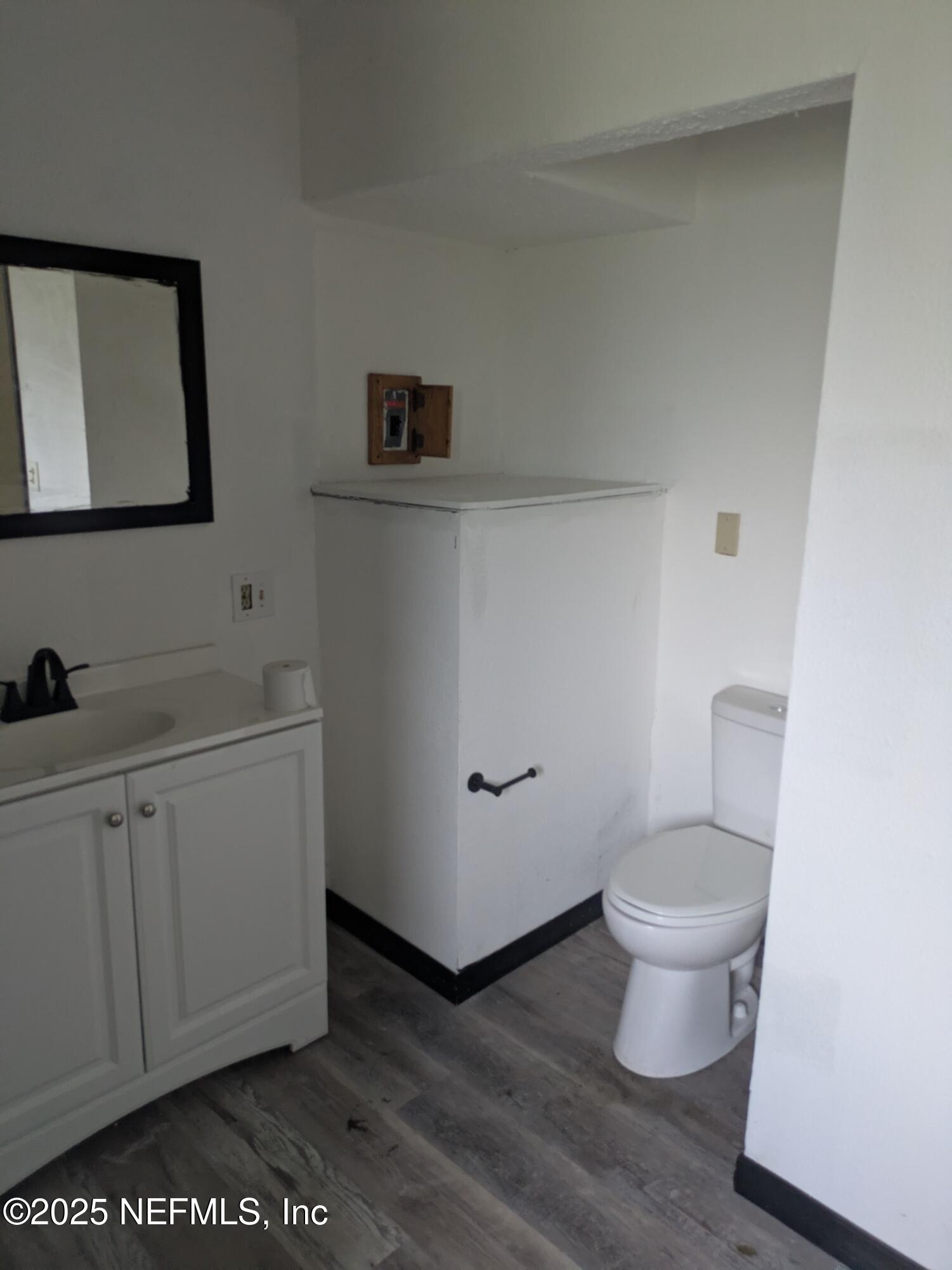 54559 Marlee Road Callahan, FL 32011 - Photo 12 of 33 a bathroom with a toilet and a sink