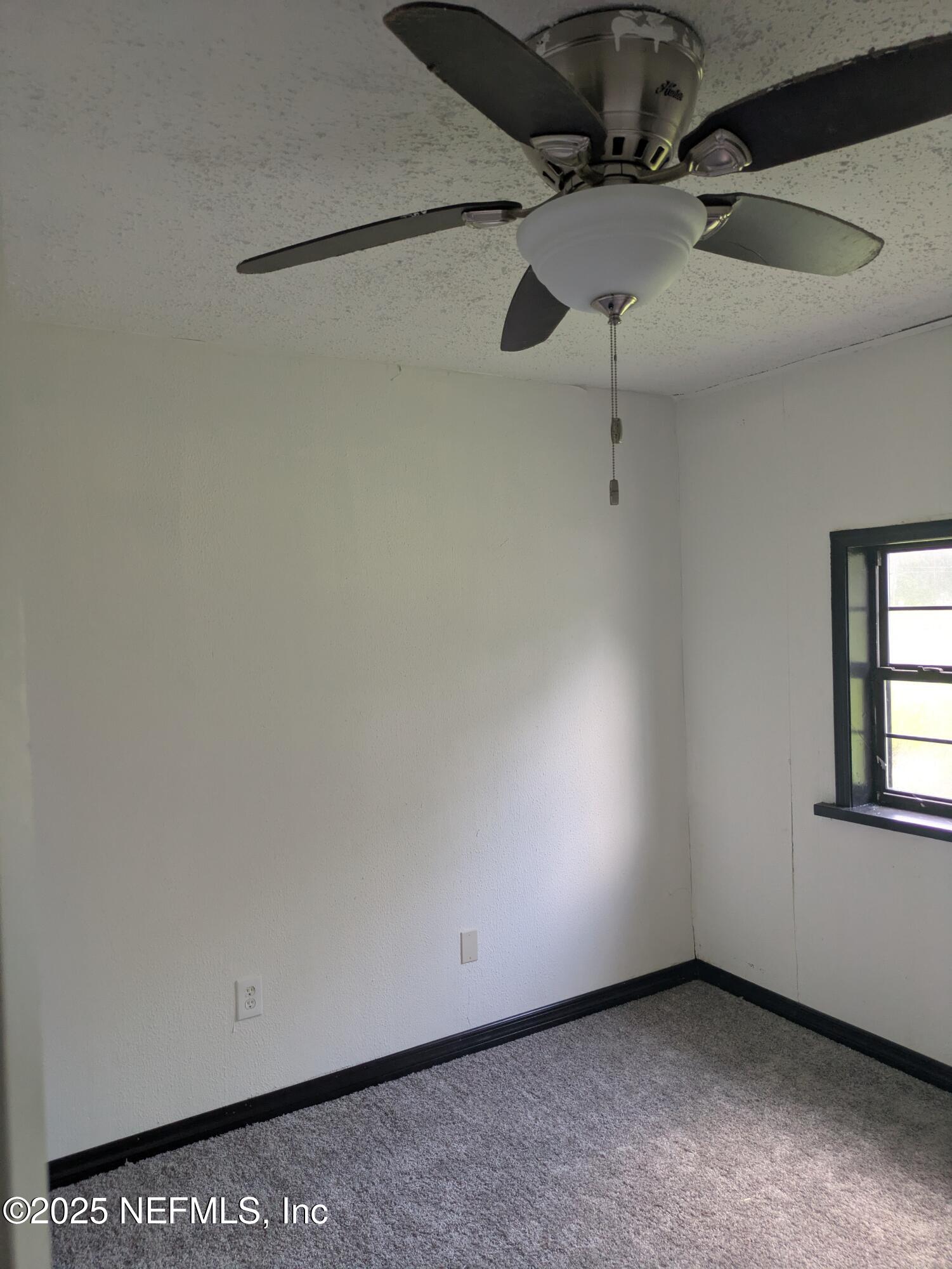 54559 Marlee Road Callahan, FL 32011 - Photo 17 of 33 a view of a room with an empty space