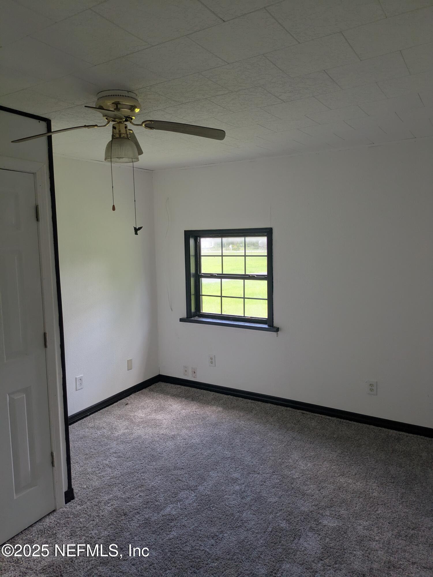 54559 Marlee Road Callahan, FL 32011 - Photo 20 of 33 an empty room with a window
