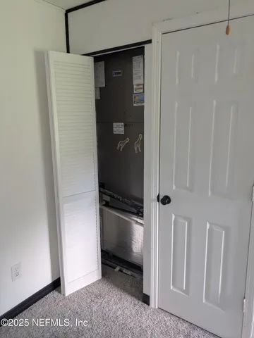 a view of a walk in closet