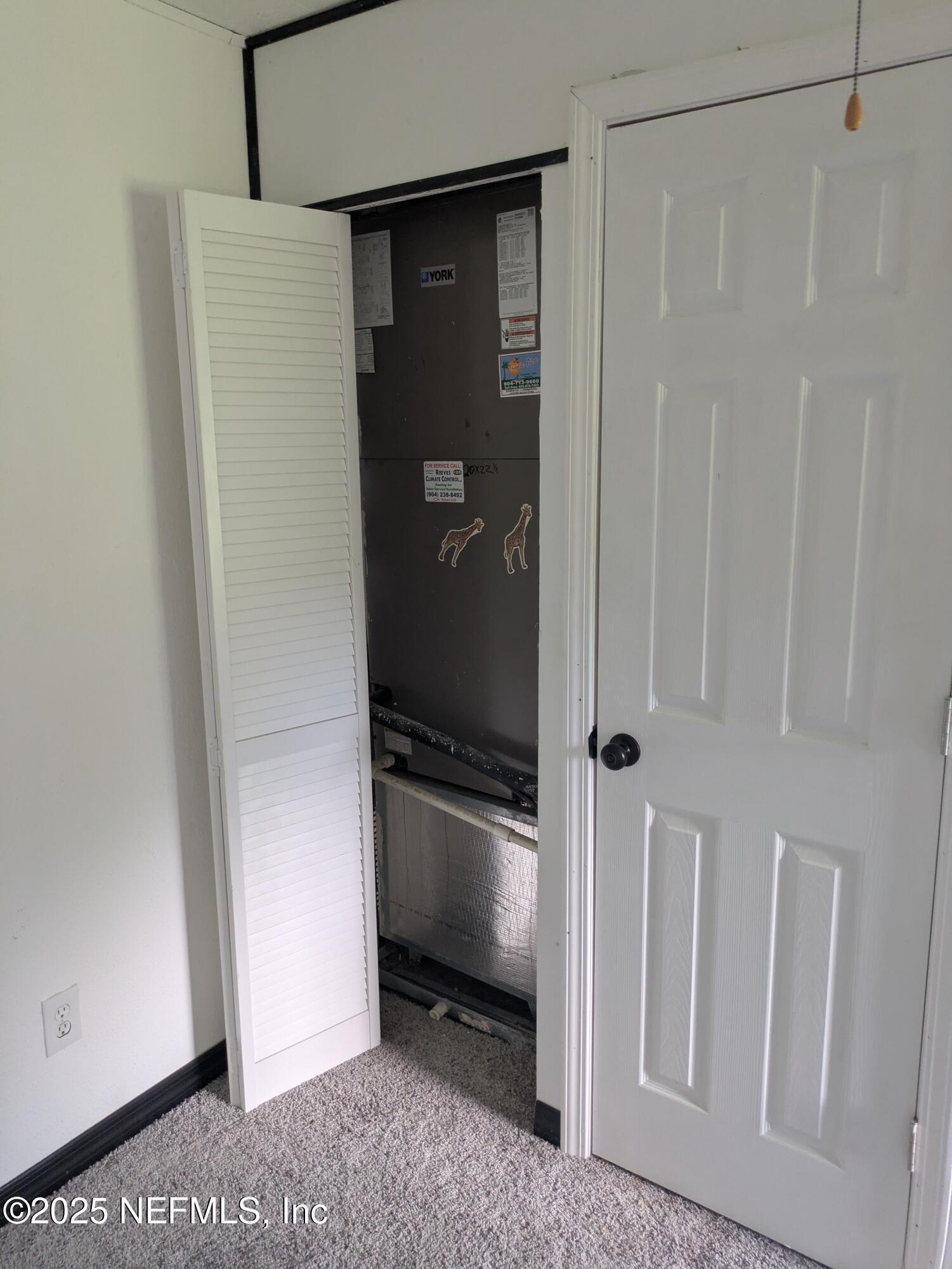 54559 Marlee Road Callahan, FL 32011 - Photo 21 of 33 a view of a walk in closet