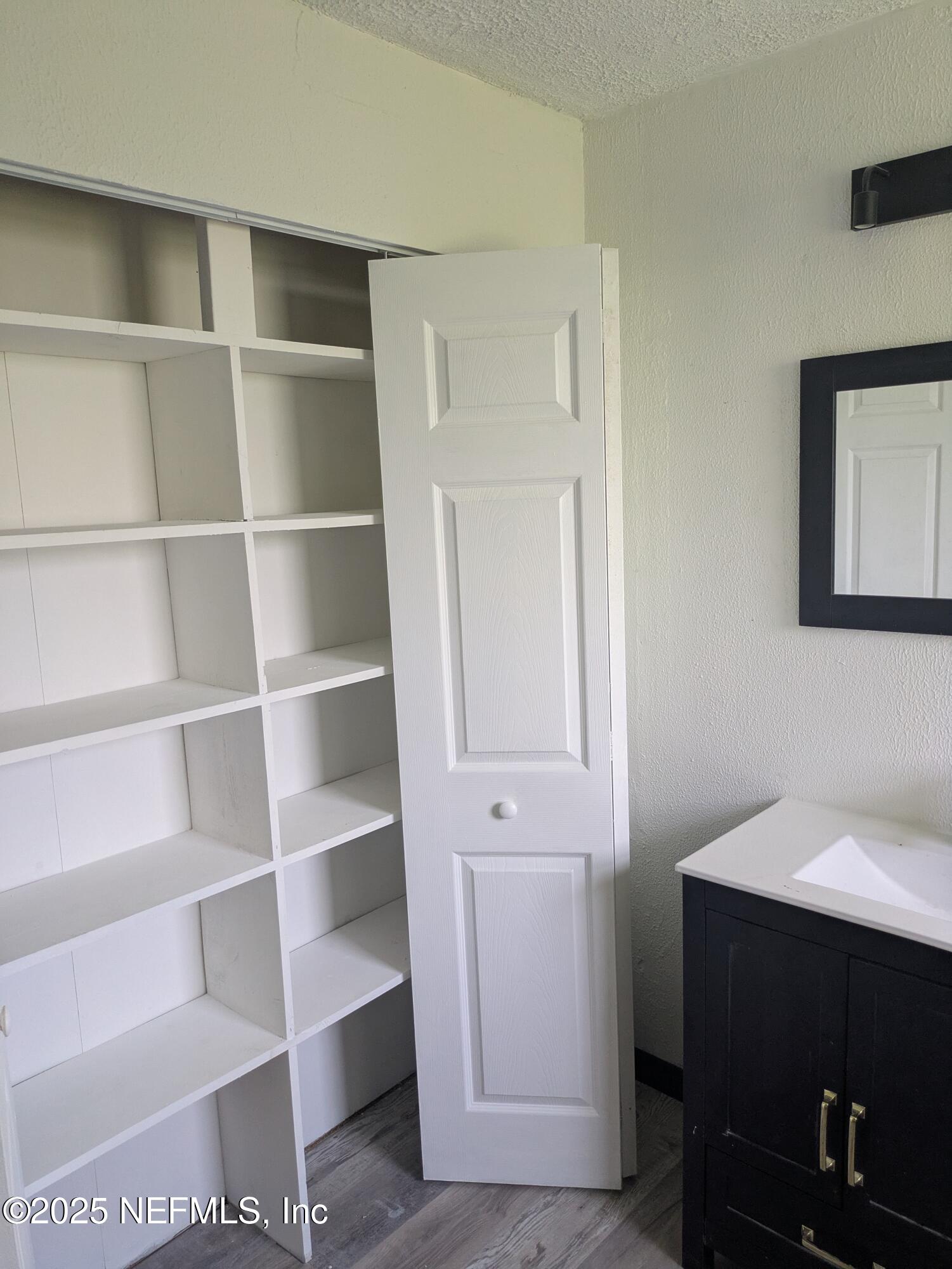 54559 Marlee Road Callahan, FL 32011 - Photo 27 of 33 a view of an empty walk in closet