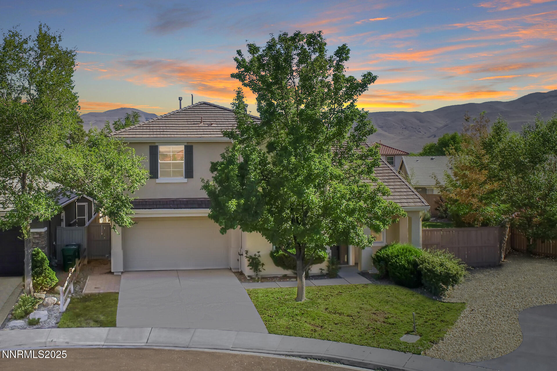 10630 Birch Point Court Reno, NV 89521 - Photo 1 of 42 a front view of a house with a yard