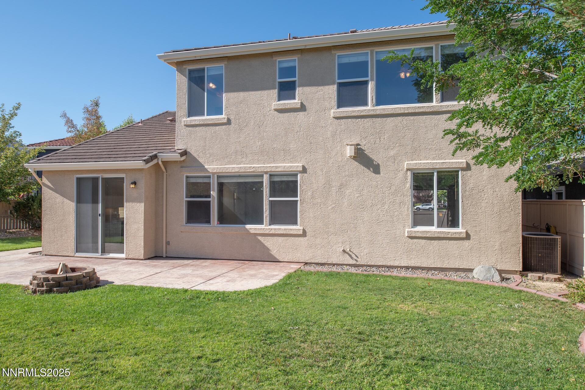 10630 Birch Point Court Reno, NV 89521 - Photo 31 of 42 front view of a house with a yard