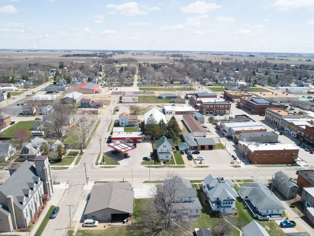 an aerial view of a city with ocean view