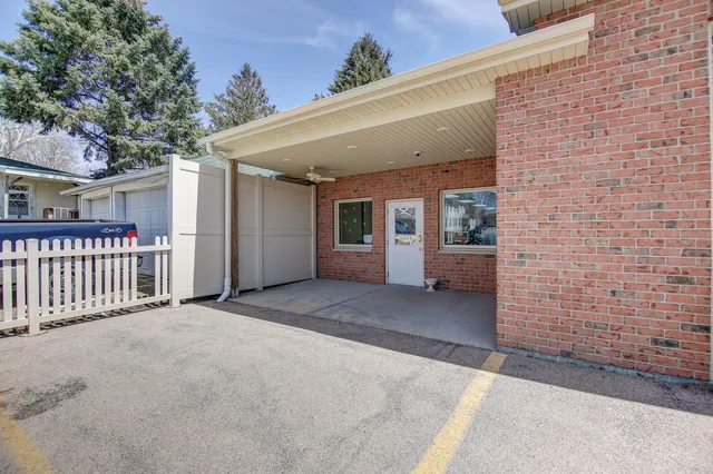 a view of a car parked in front of a building