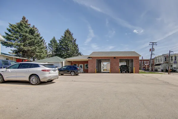 a view of car parked in front of house