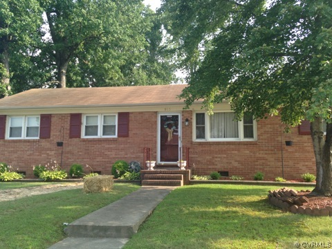 915 Yorkshire Road Colonial Heights, VA 23834 - Photo 1 of 13 front view of a house with a yard