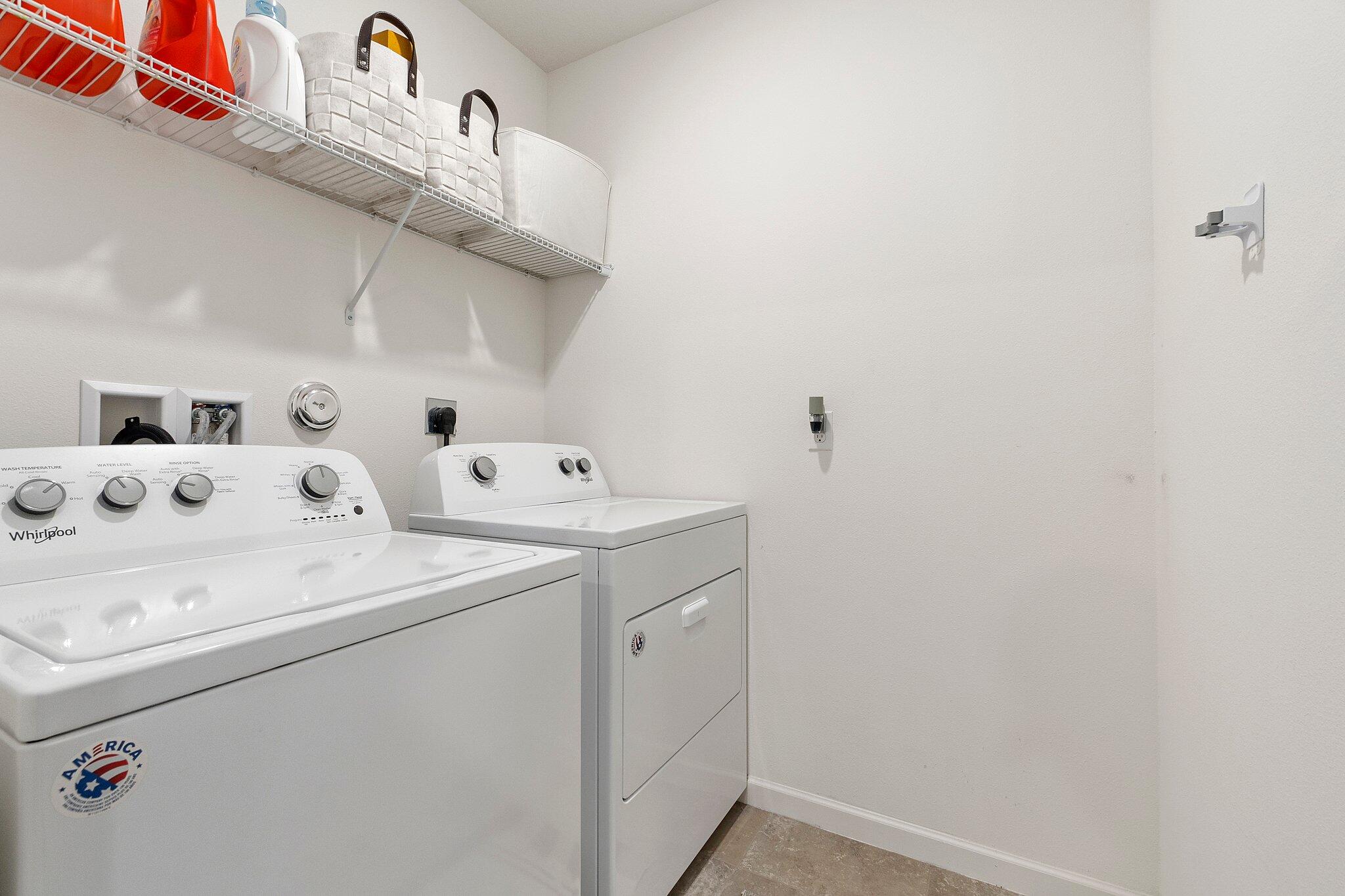 10850 Pacini Way Port St. Lucie, FL 34987 - Photo 25 of 36 a utility room with dryer and washer