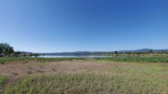 a view of a lake from a yard