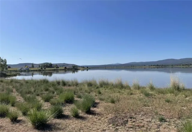 a view of a lake with a city