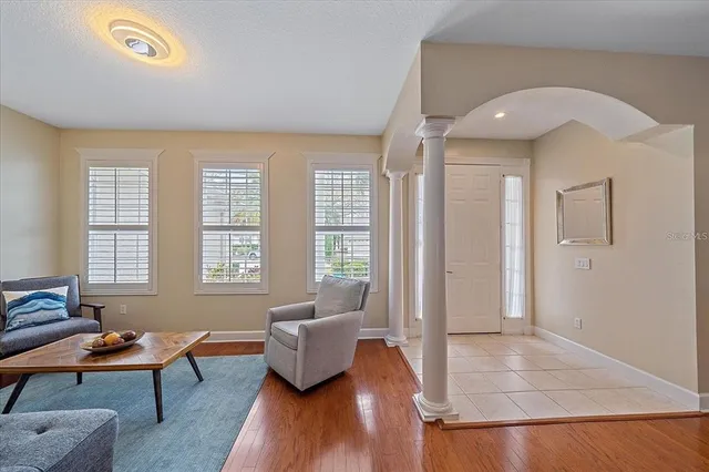 a living room with furniture and a window