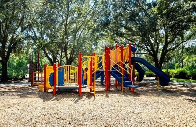 an aerial view of a pool yard swimming pool and outdoor seating