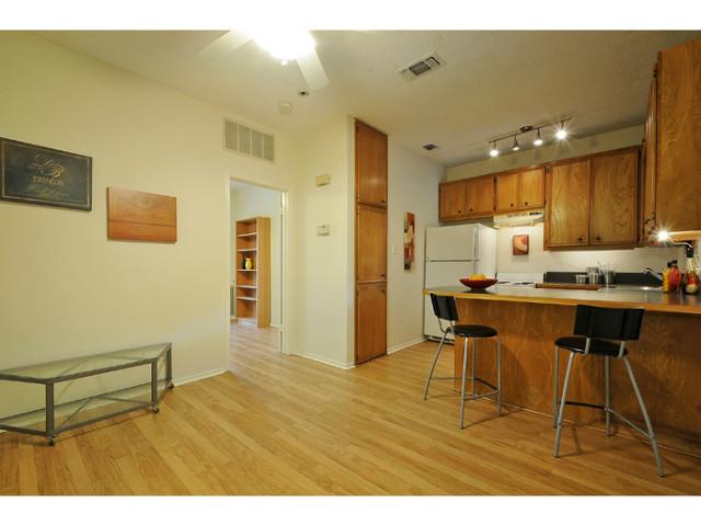 4401 Speedway, Unit 302 Austin, TX 78751 - Photo 14 of 25 Open Living to Kitchen.
