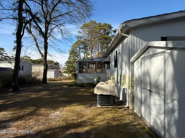 a view of a back yard of the house