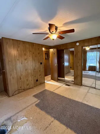 a spacious bathroom with a glass door shower