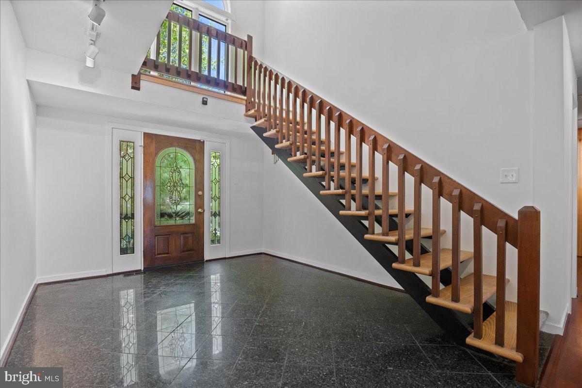 8438 Mackall Road St. Leonard, MD 20685 - Photo 12 of 68 Entry foyer with marble, solid hardwood stairs.