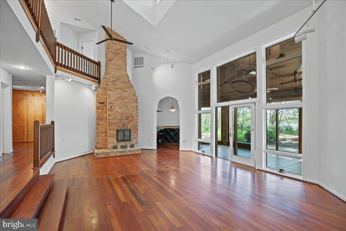 8438 Mackall Road St. Leonard, MD 20685 - Photo 16 of 68 Great room anchored by brick work, Finnish FP.