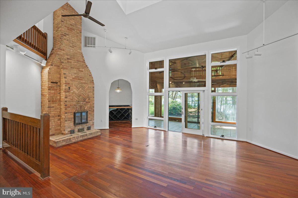 8438 Mackall Road St. Leonard, MD 20685 - Photo 18 of 68 Great room with soaring ceilings and full wet bar.