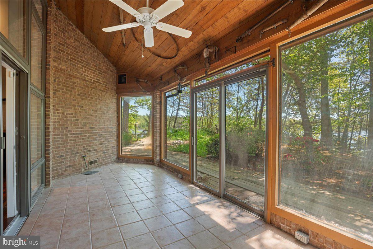 8438 Mackall Road St. Leonard, MD 20685 - Photo 21 of 68 Glass porch or sunroom with creek and garden view!