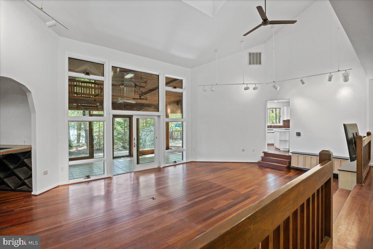 8438 Mackall Road St. Leonard, MD 20685 - Photo 22 of 68 Tons of glass leading looking out over the point.