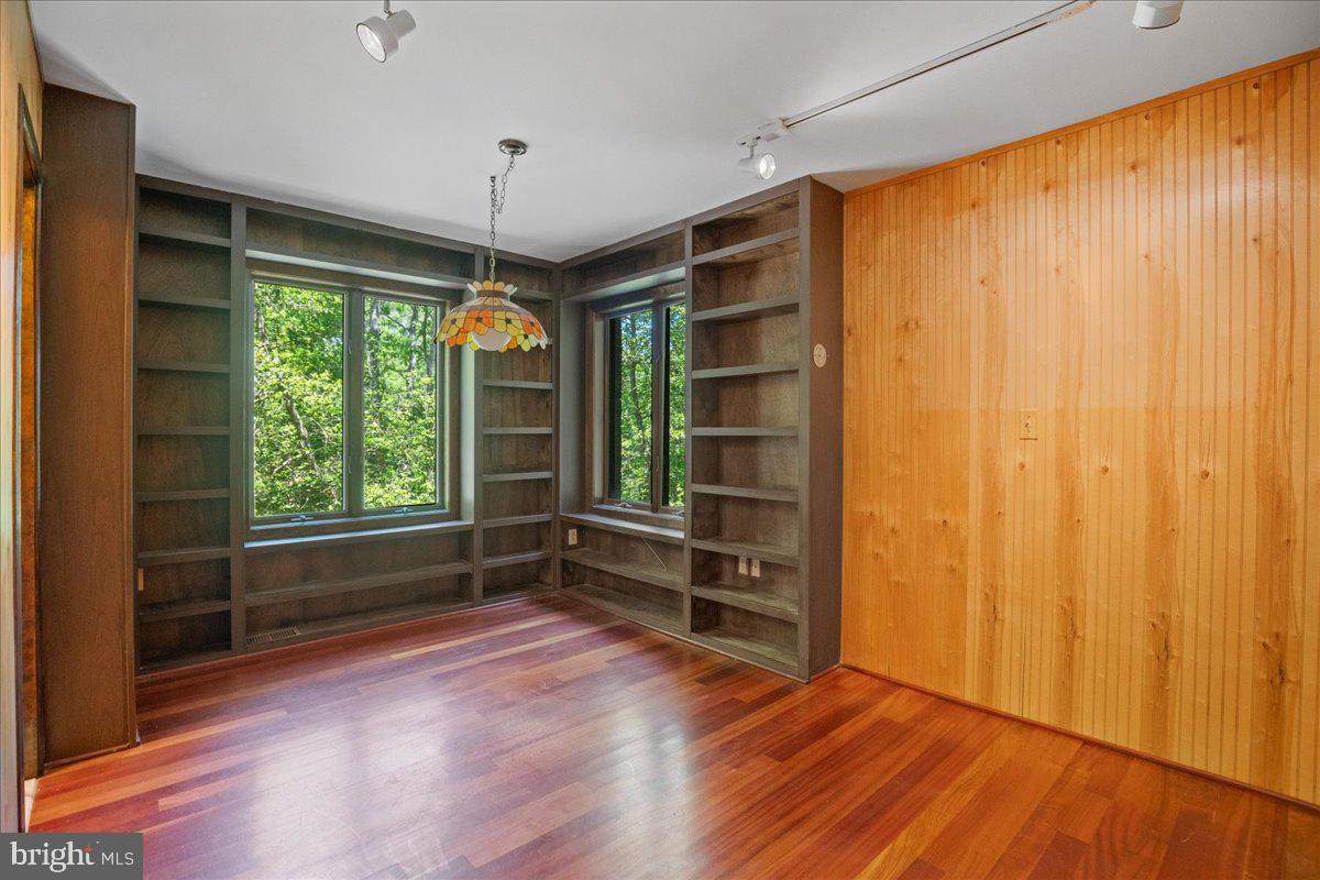 8438 Mackall Road St. Leonard, MD 20685 - Photo 31 of 68 Library or Game room with built-ins!