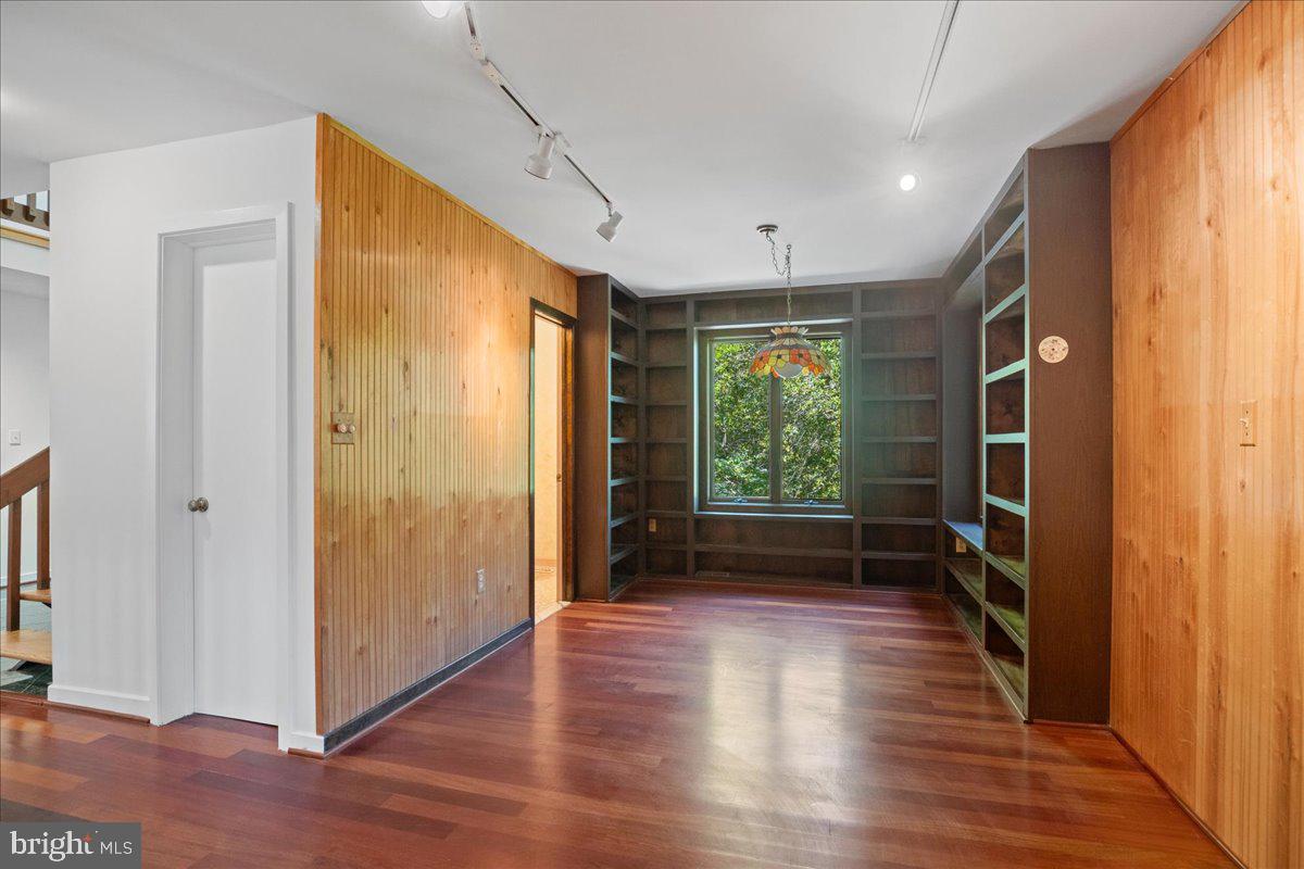 8438 Mackall Road St. Leonard, MD 20685 - Photo 32 of 68 Looking to main level half bath.