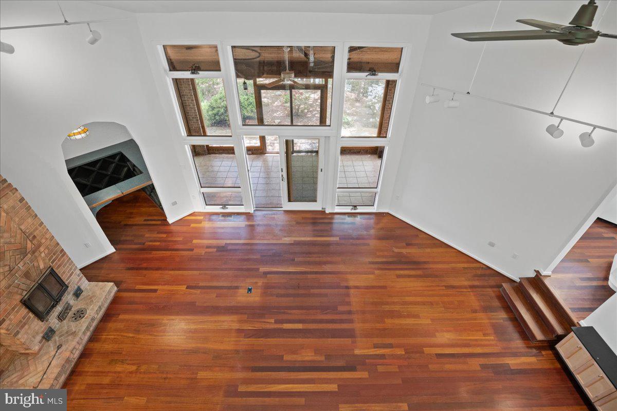 8438 Mackall Road St. Leonard, MD 20685 - Photo 39 of 68 Looking down from the second level