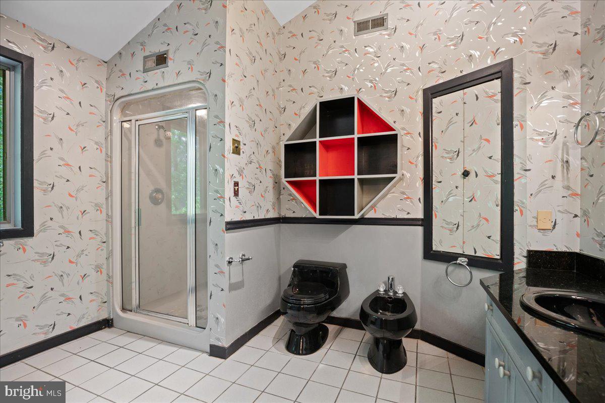 8438 Mackall Road St. Leonard, MD 20685 - Photo 45 of 68 Large primary bath with shower and jetted jub.