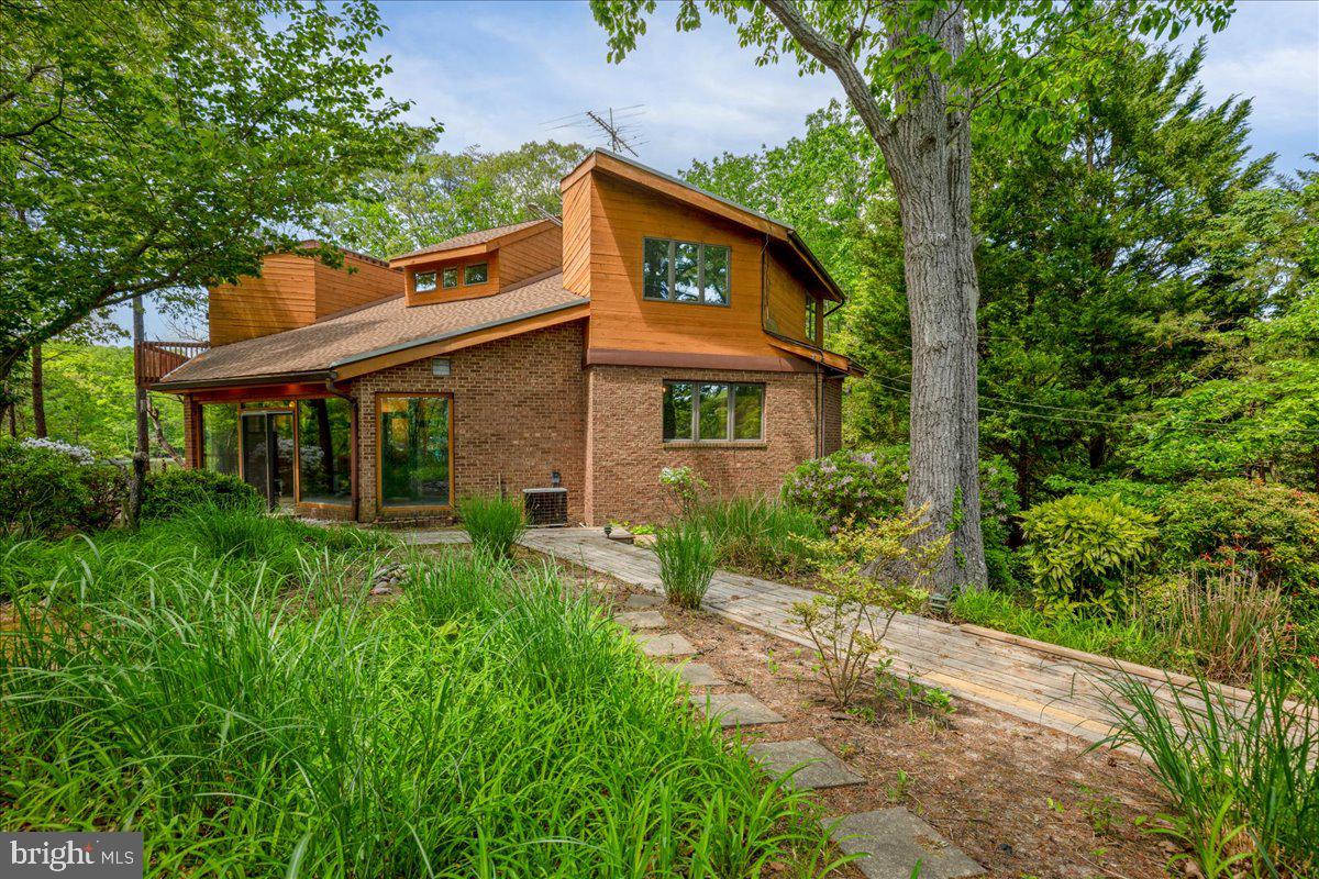 8438 Mackall Road St. Leonard, MD 20685 - Photo 63 of 68 Walking back from the pier and garden,