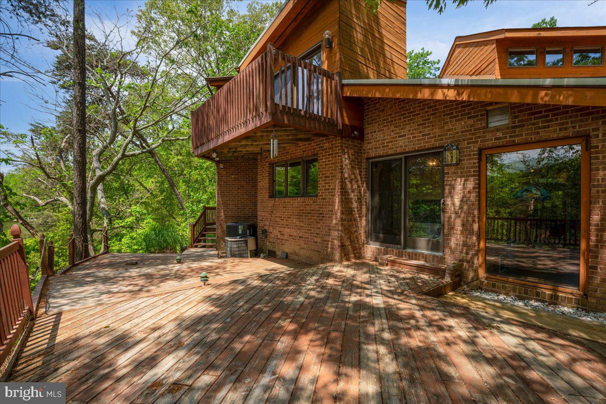 8438 Mackall Road St. Leonard, MD 20685 - Photo 64 of 68 Primary suite balcony above