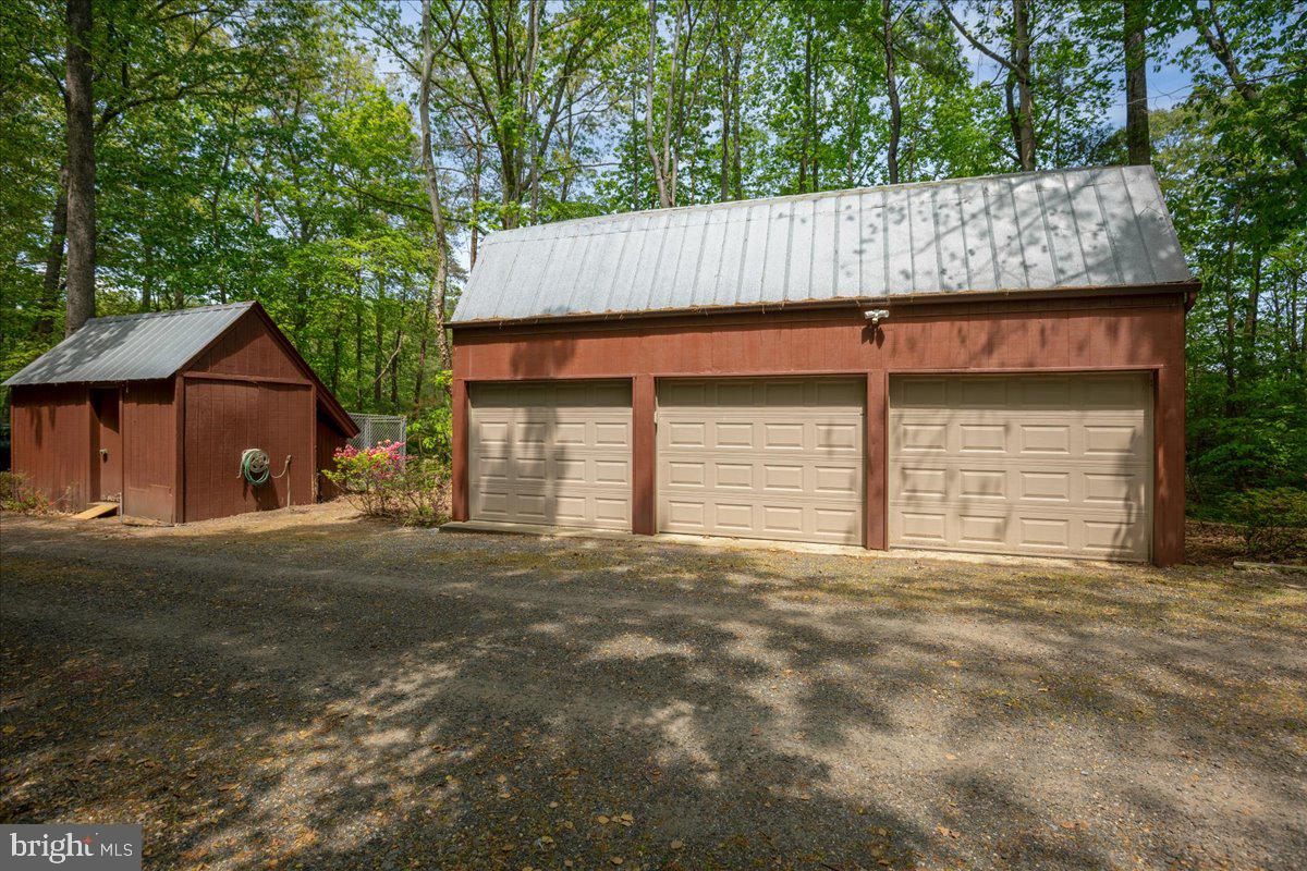 8438 Mackall Road St. Leonard, MD 20685 - Photo 9 of 68 Detached 3 car garage and shed/shop.