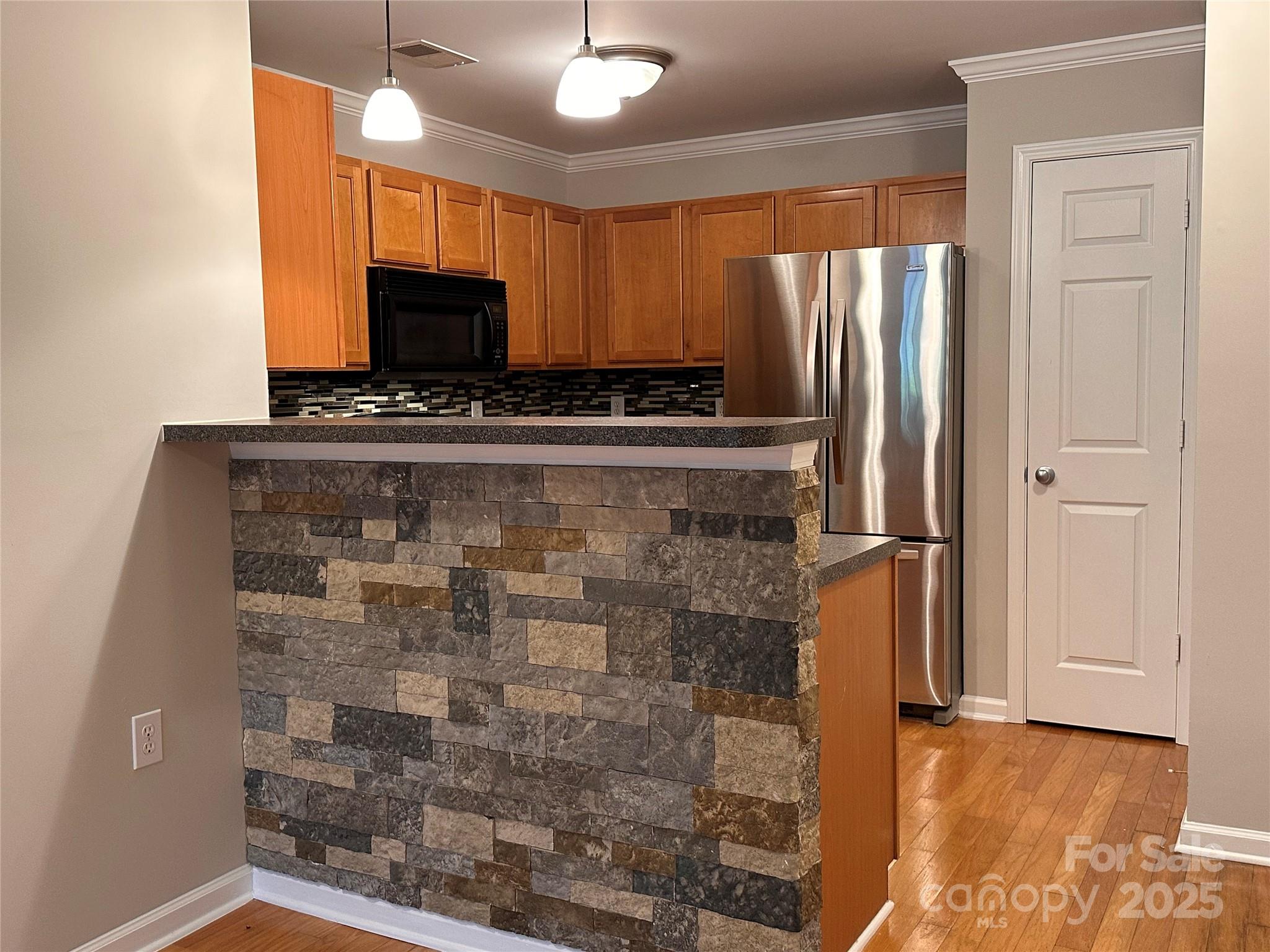5236 Hilltop Road Jamestown, NC 27282 - Photo 6 of 27 a view of a refrigerator in the kitchen