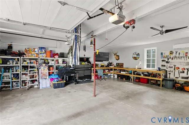 a view of a garage with a lot of stuff