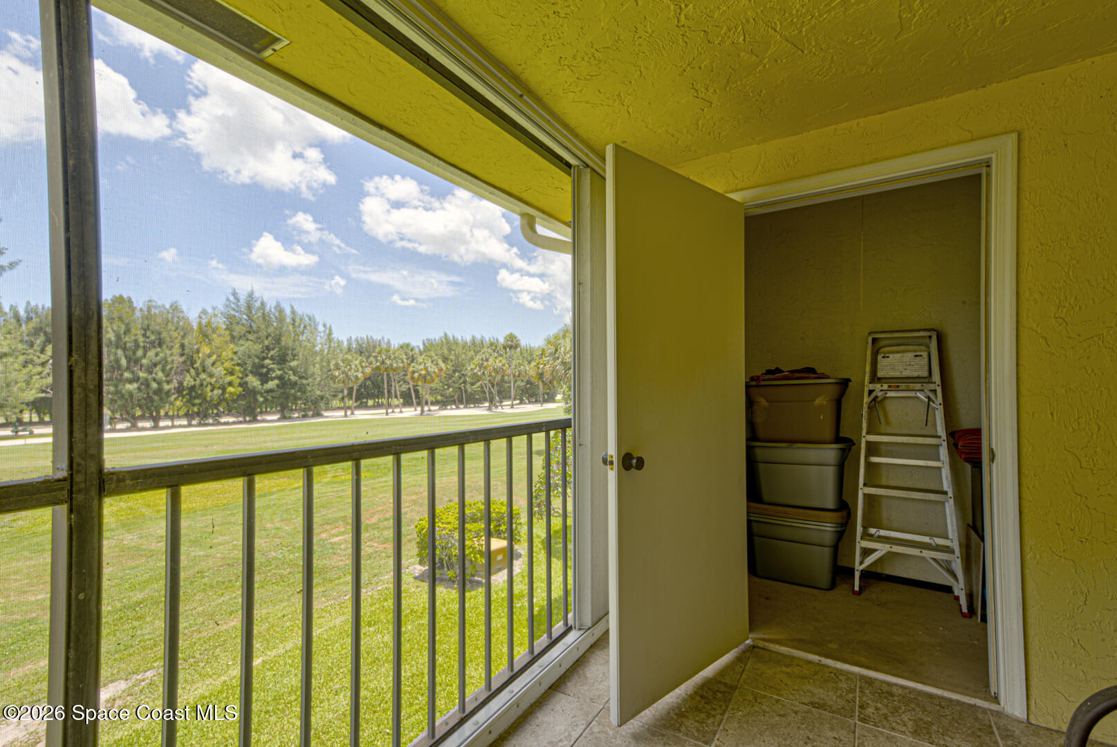 1142 Keystone Drive, Unit F Jupiter, FL 33458 - Photo 31 of 43 balcony with storage closet