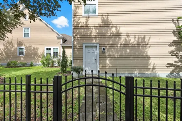 a view of a brick building from a balcony