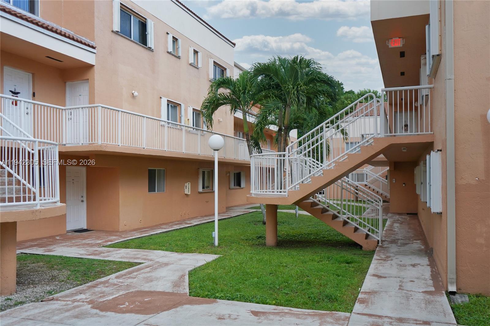 14911 Southwest 80th Street, Unit 221 Miami, FL 33193 - Photo 12 of 31 a view of outdoor space yard and deck