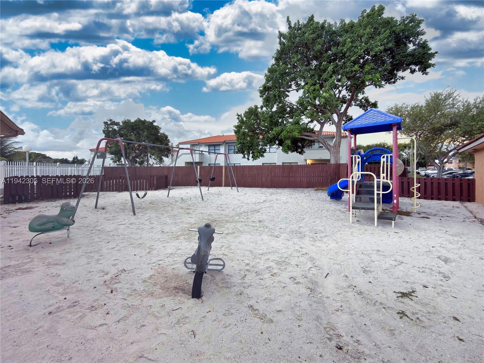 14911 Southwest 80th Street, Unit 221 Miami, FL 33193 - Photo 12 of 31 a view of a park with slide