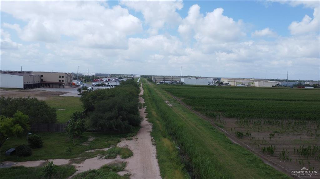 1524 West Hi Line Road Pharr, TX 78577 - Photo 14 of 34 a view of a lake with a big yard