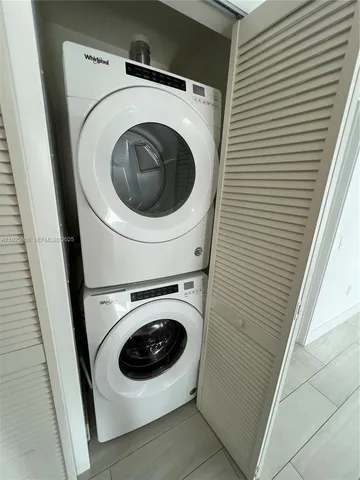 a kitchen with a appliances and cabinets