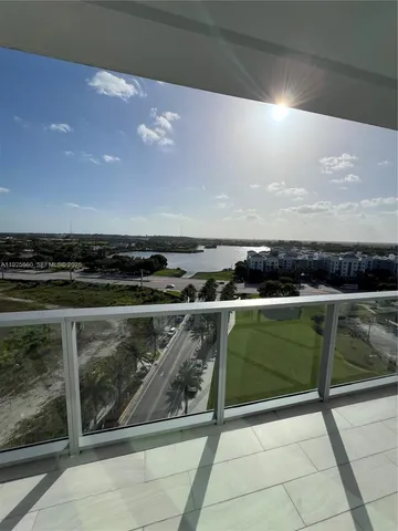 a view of room with window and lounge chair