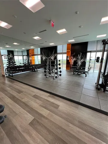 a view of a room with gym equipment