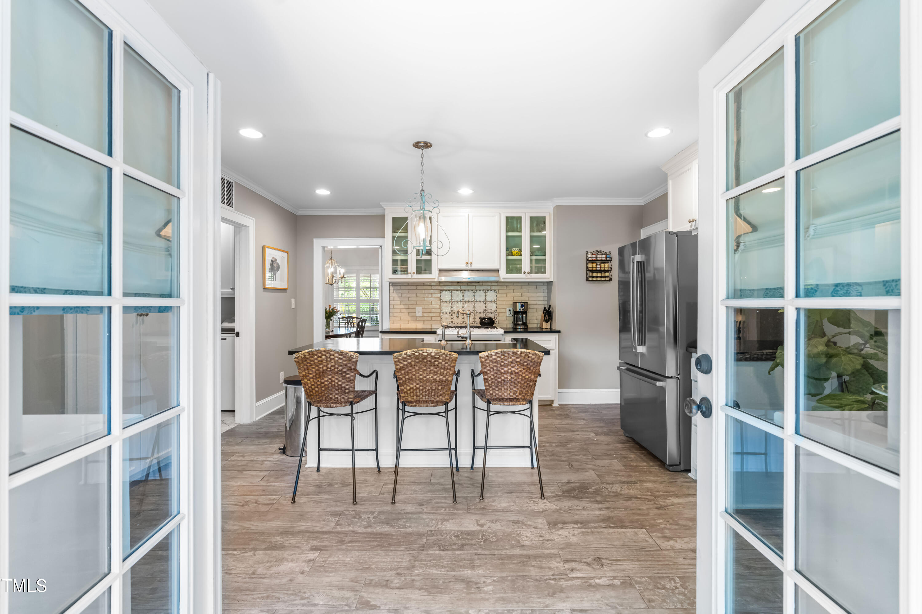 2725 Bedford Avenue Raleigh, NC 27607 - Photo 17 of 48 French doors open to patio
