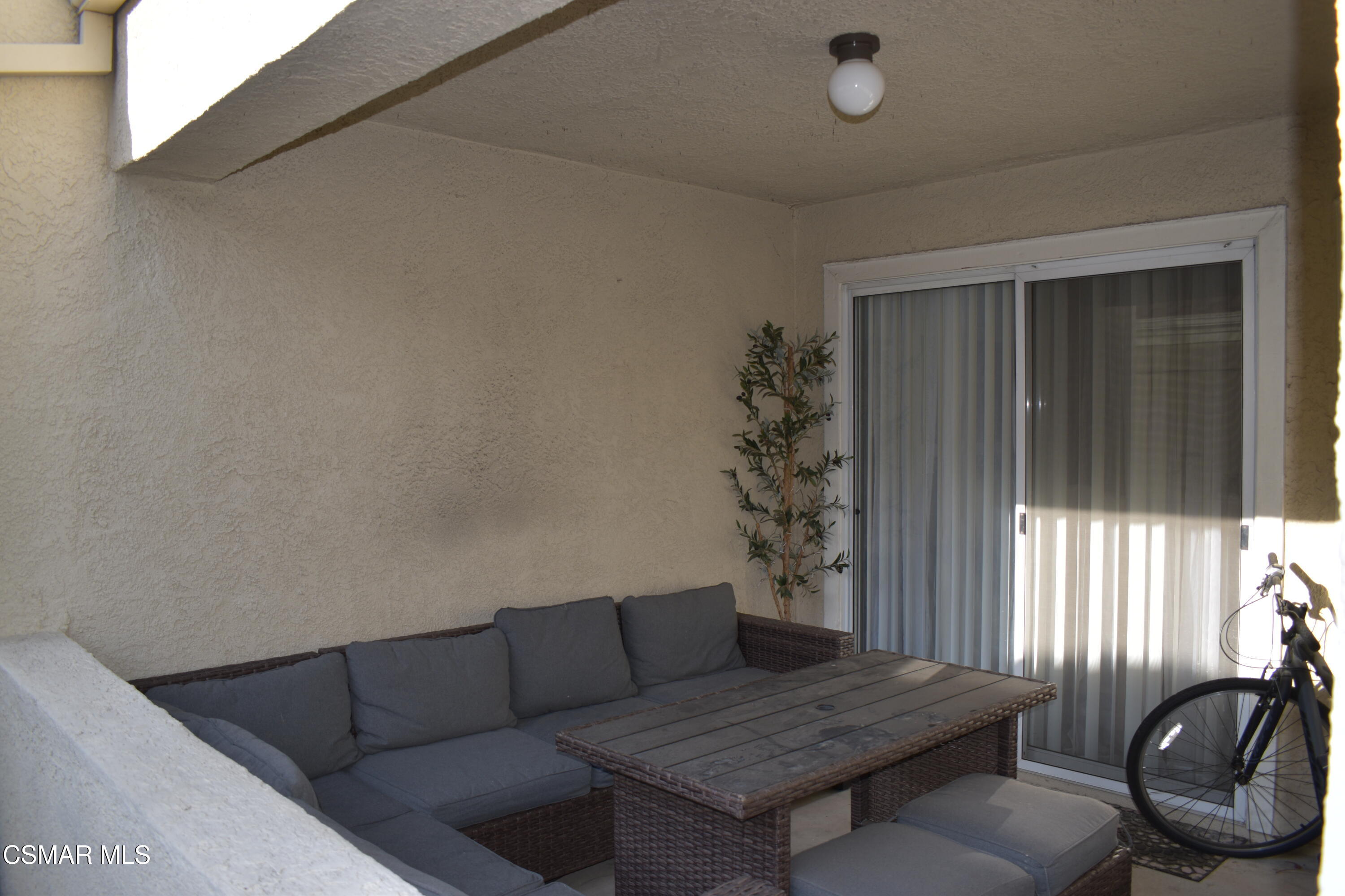 4240 Lost Hills Road, Unit 2901 Calabasas, CA 91301 - Photo 8 of 15 a living room with furniture and a window