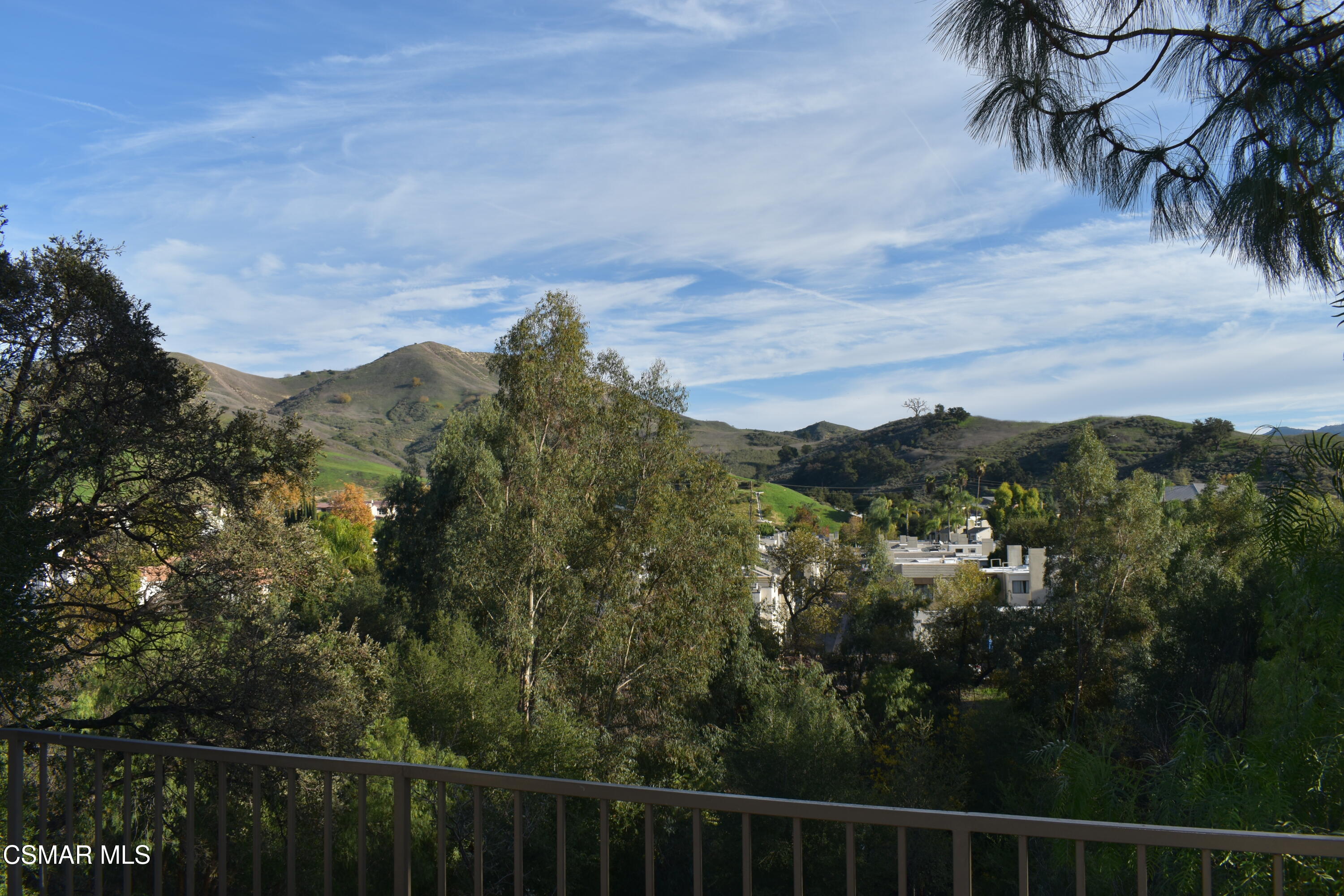 4240 Lost Hills Road, Unit 2901 Calabasas, CA 91301 - Photo 10 of 15 a view of a city with lush green forest