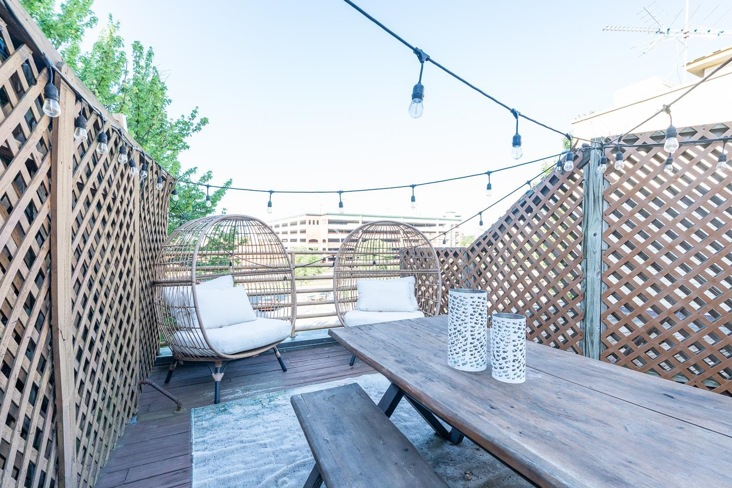 323 West Main Street, Unit B Durham, NC 27701 - Photo 11 of 14 a view of balcony with wooden floor and outdoor seating