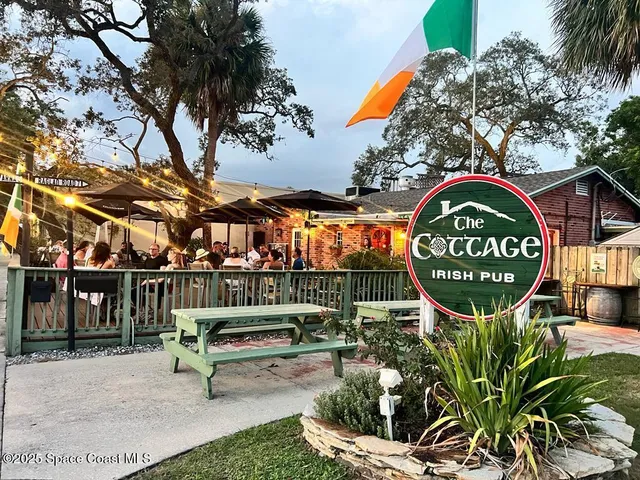 a view of a street with an outdoor space
